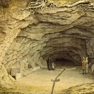 The cave entrance and rock face