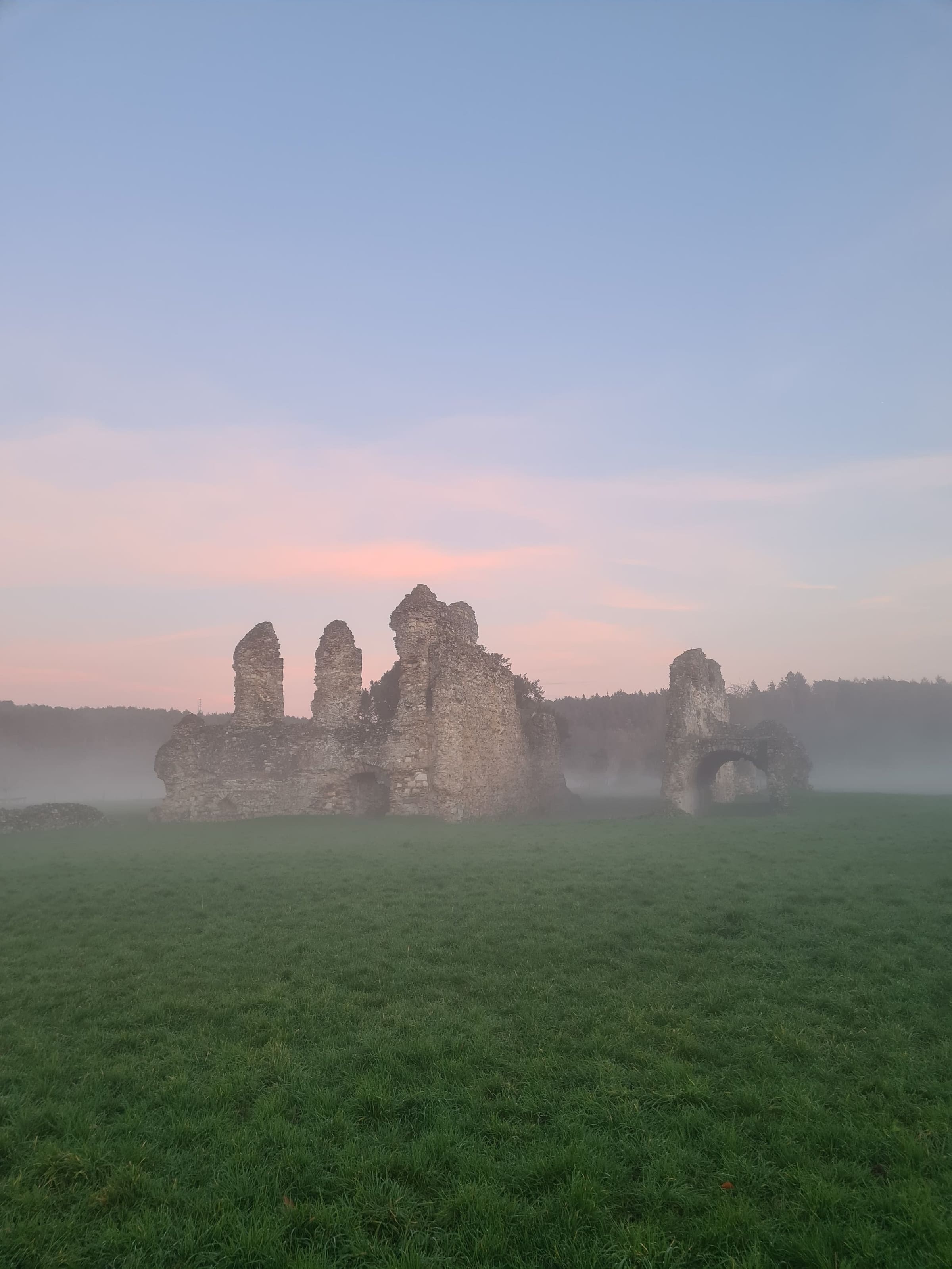 The ruins of Waverley Abbey at dawn, mist on the meadow