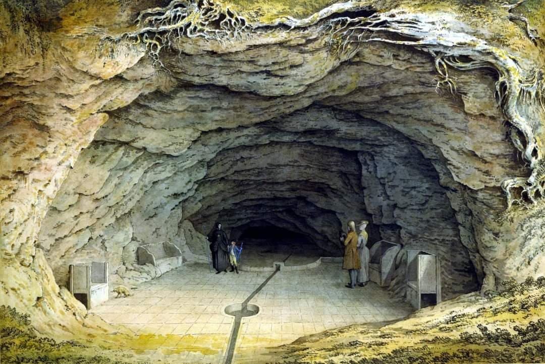 A painted impression of the restored cave interior, with visitors examining the chamber